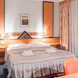 Suite met een Queen Size Bed